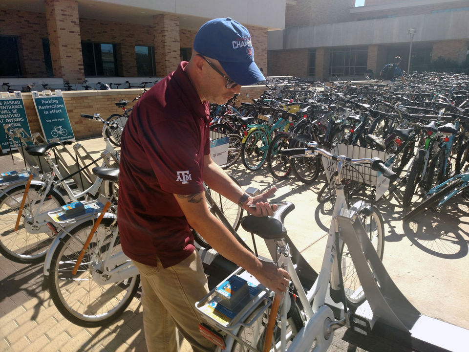 Ron Steedly with the Zagster bikes